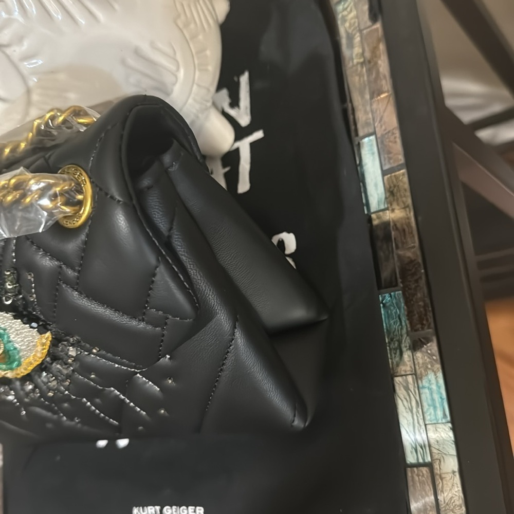 Kurt Geiger London
Mini Kensington Eye Crossbody Bag - Picture 8 of 15